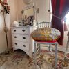 Antique French Orange Satin Oval Pillow Cushion with Linen Flower Overlay Couch Bed Chair or Sofa circa 1910-20's