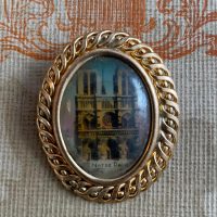 Vintage French Oval Brooch Featuring a Print of Notre Dame Cathedral Gold Tone Metal Setting Miniature Badge Jewellery 1950’s / EVE
